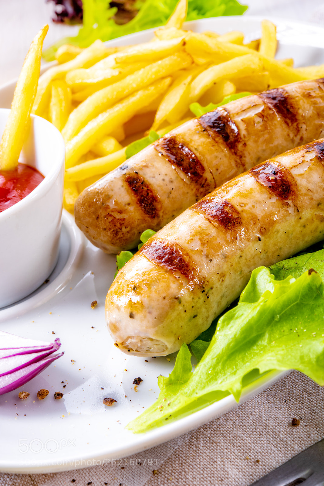 Nikon D810 sample photo. Grilled bratwurst with chips photography