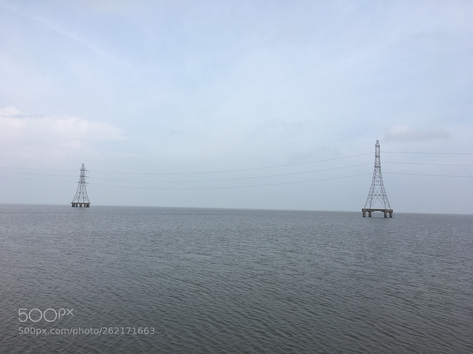 Apple iPhone 6s sample photo. Power towers on lake photography