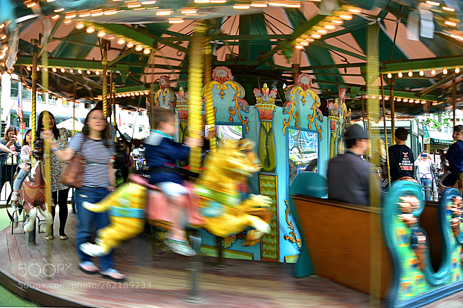 Nikon D3400 sample photo. Riding the carousel photography