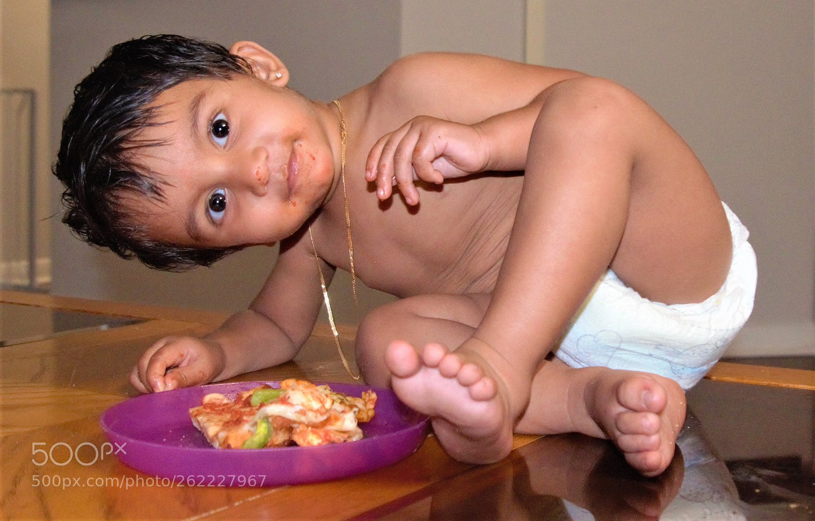 Nikon D5100 sample photo. Shrihaan and his pizza photography