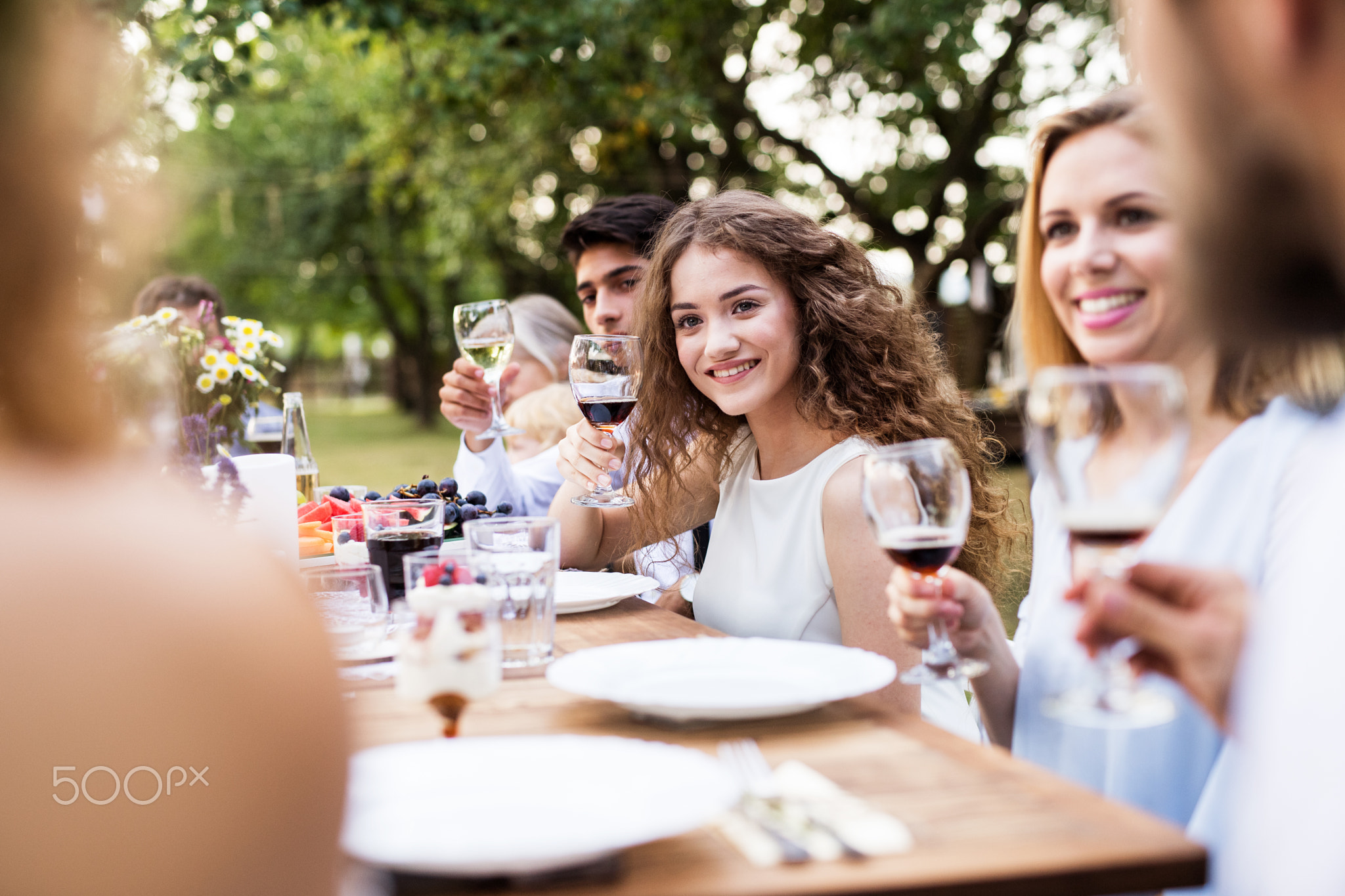 Family celebration or a garden party outside in the backyard.