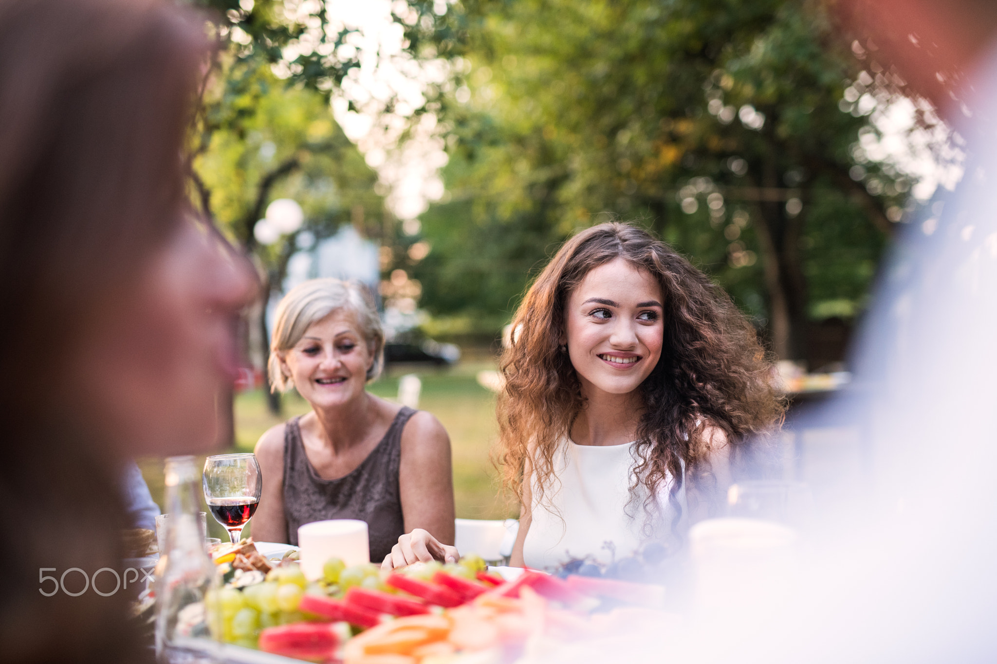 Family celebration or a garden party outside in the backyard.