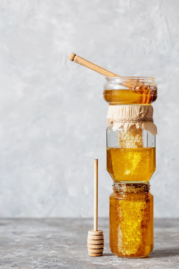 Honey with a honeycomb by Roman Debree on 500px.com