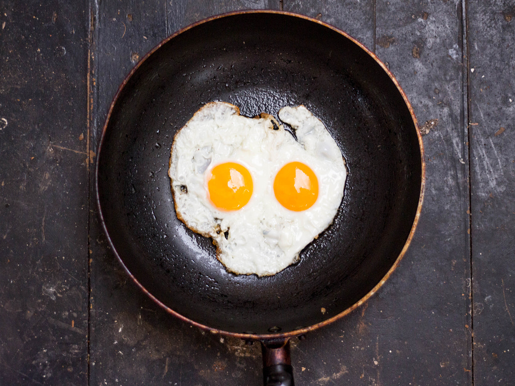 Fired eggs in a frying pan like a skull by Phuphan Sornwismongkol on 500px.com