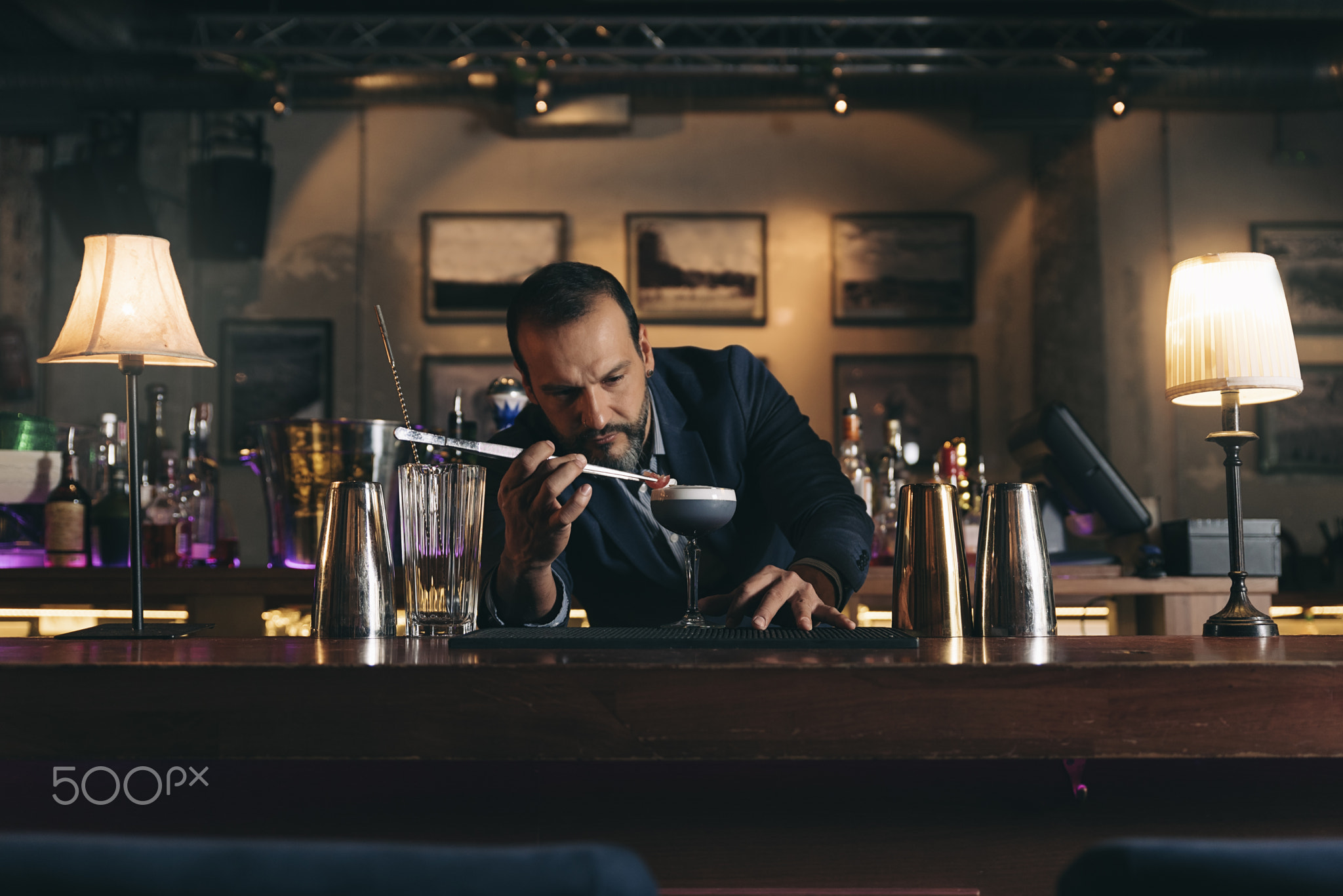 Barman making cocktails at the night club.