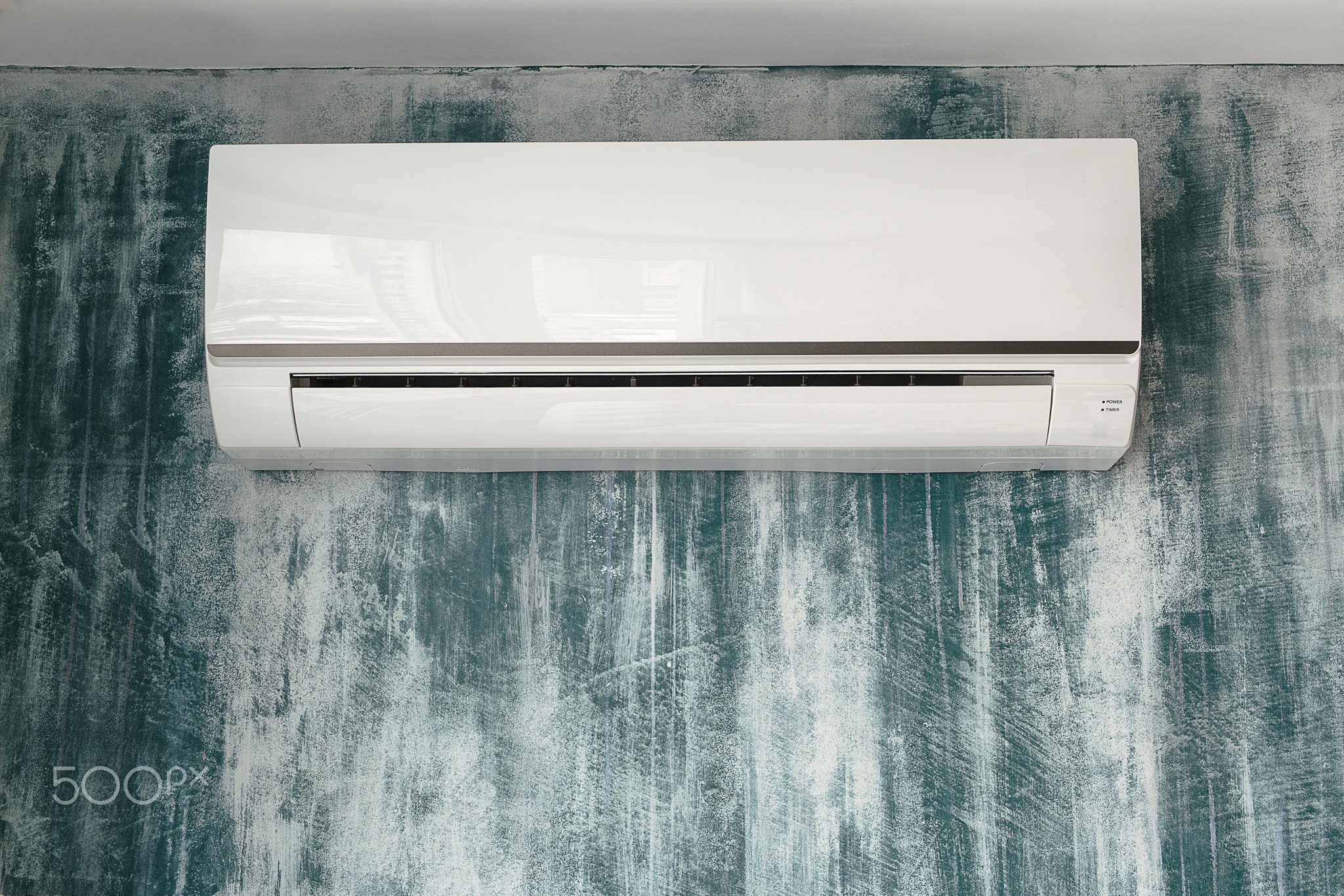 Air conditioner on wall background