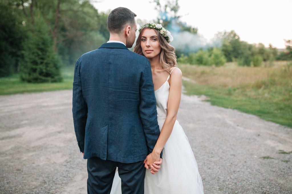 Bride and groom at wedding Day walking Outdoors on summer nature. Bridal couple, Happy Newlywed... by Andrii Afanasiev on 500px.com