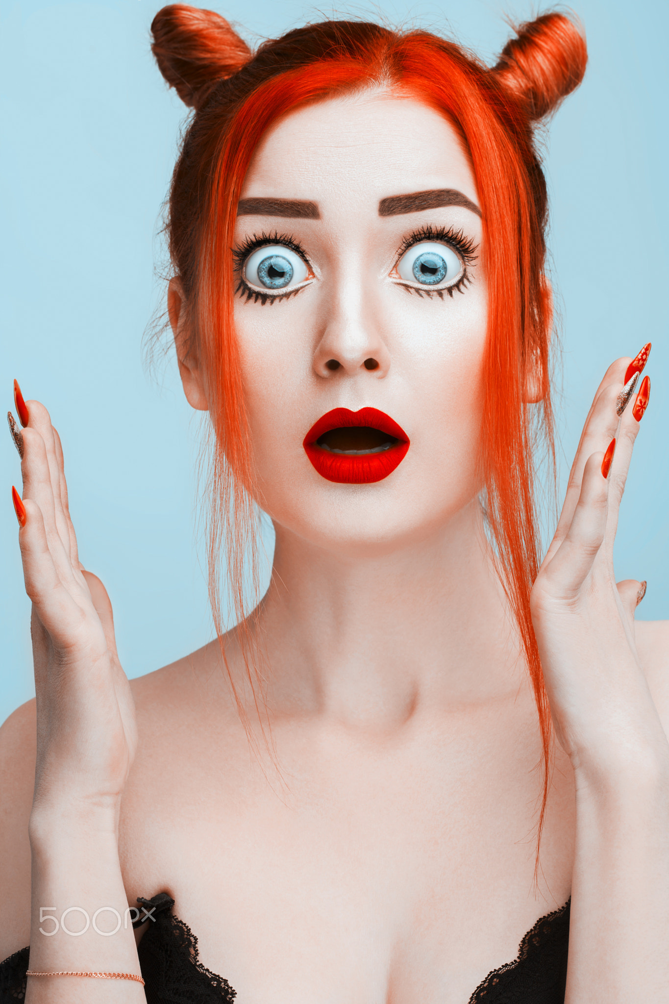 Studio Portrait of Beautiful Pretty Surprised Girl