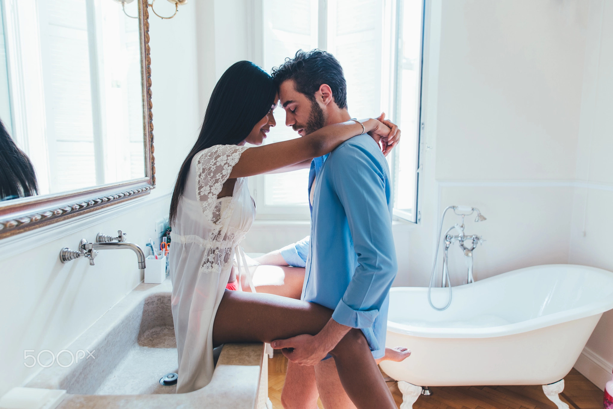 Couple in love spending time together in the house. Romantic mom