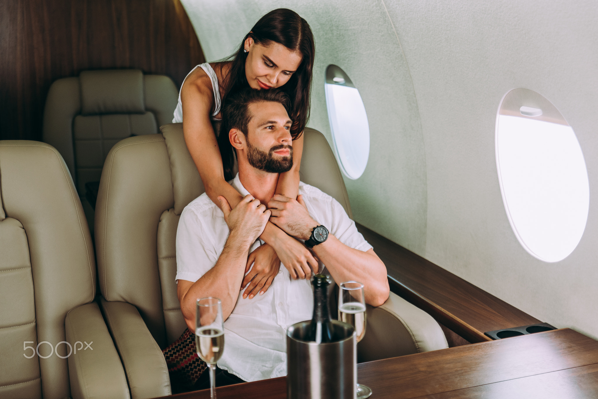 Couple on vacation, flying on their private jet