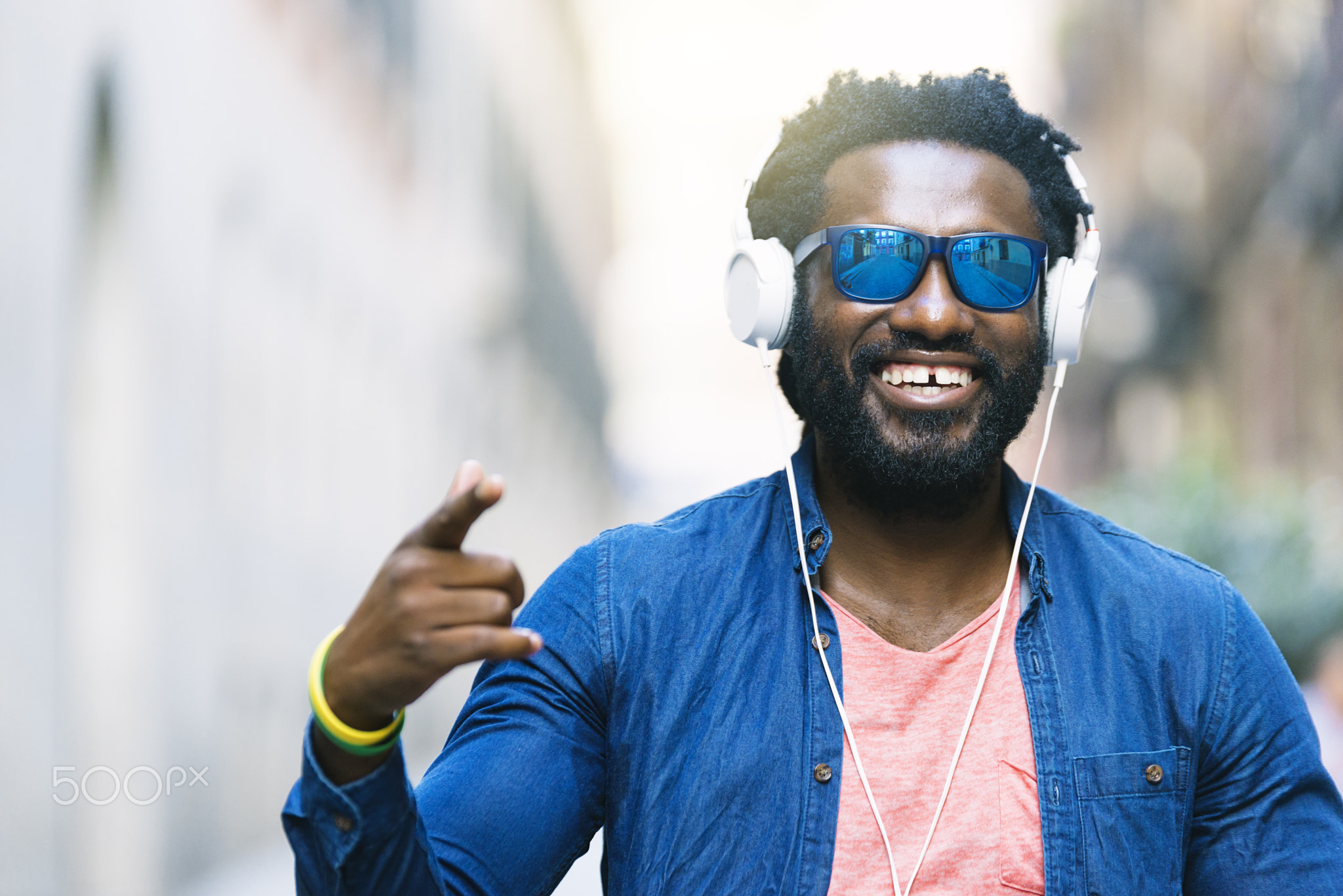 African Young Man Listening Music.