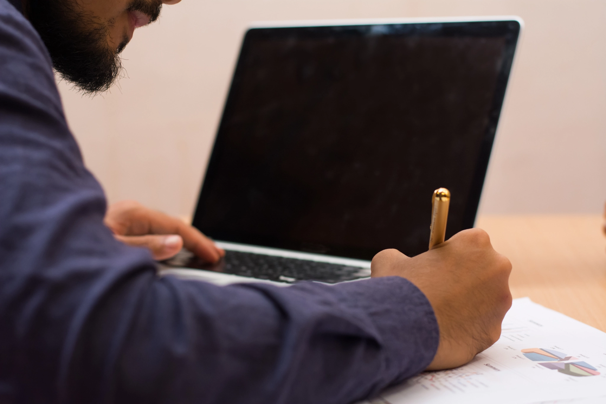 Business man working at office with phone.tablet and graph data