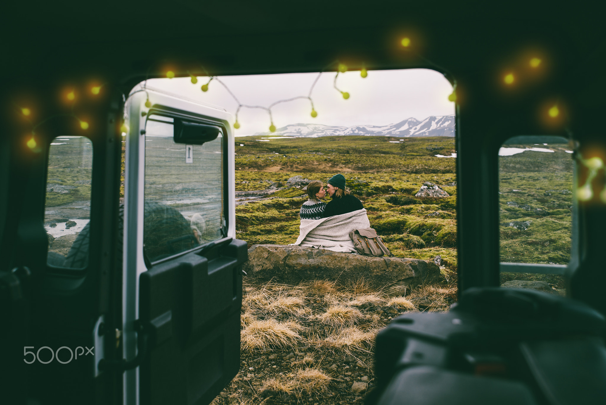 Couple making a wanderlust vacation, exploring iceland with thei