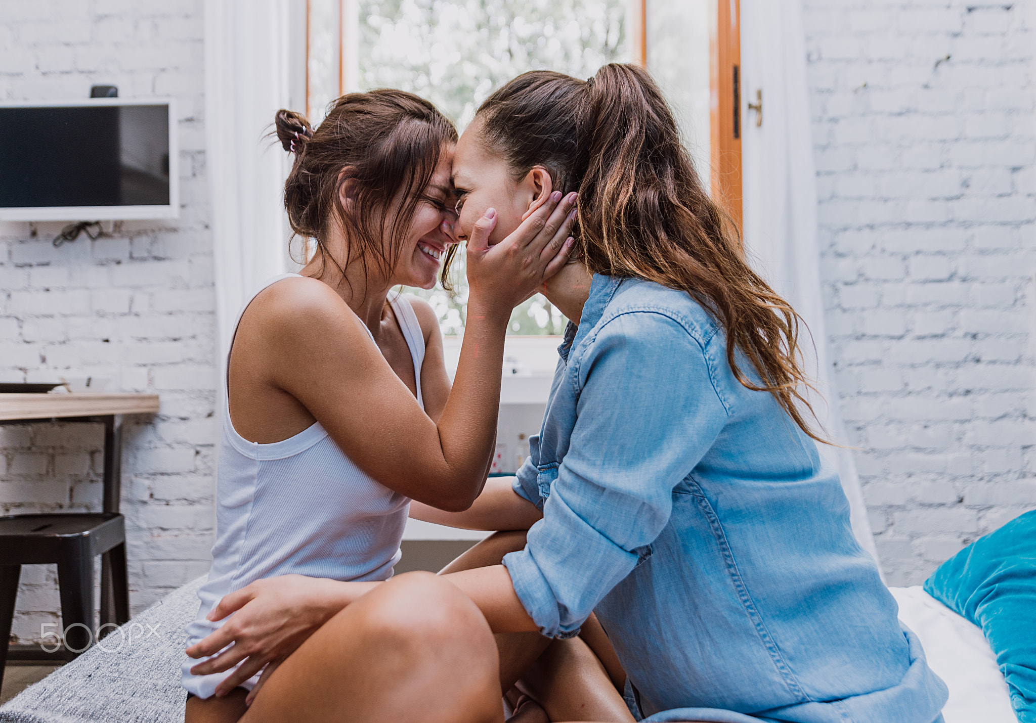 Lesbian couple at home