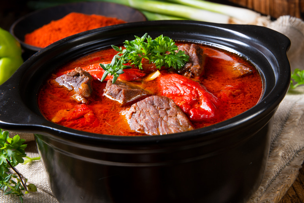 A real Hungarian goulash with beef and paprika by Darius Dzinnik on 500px.com