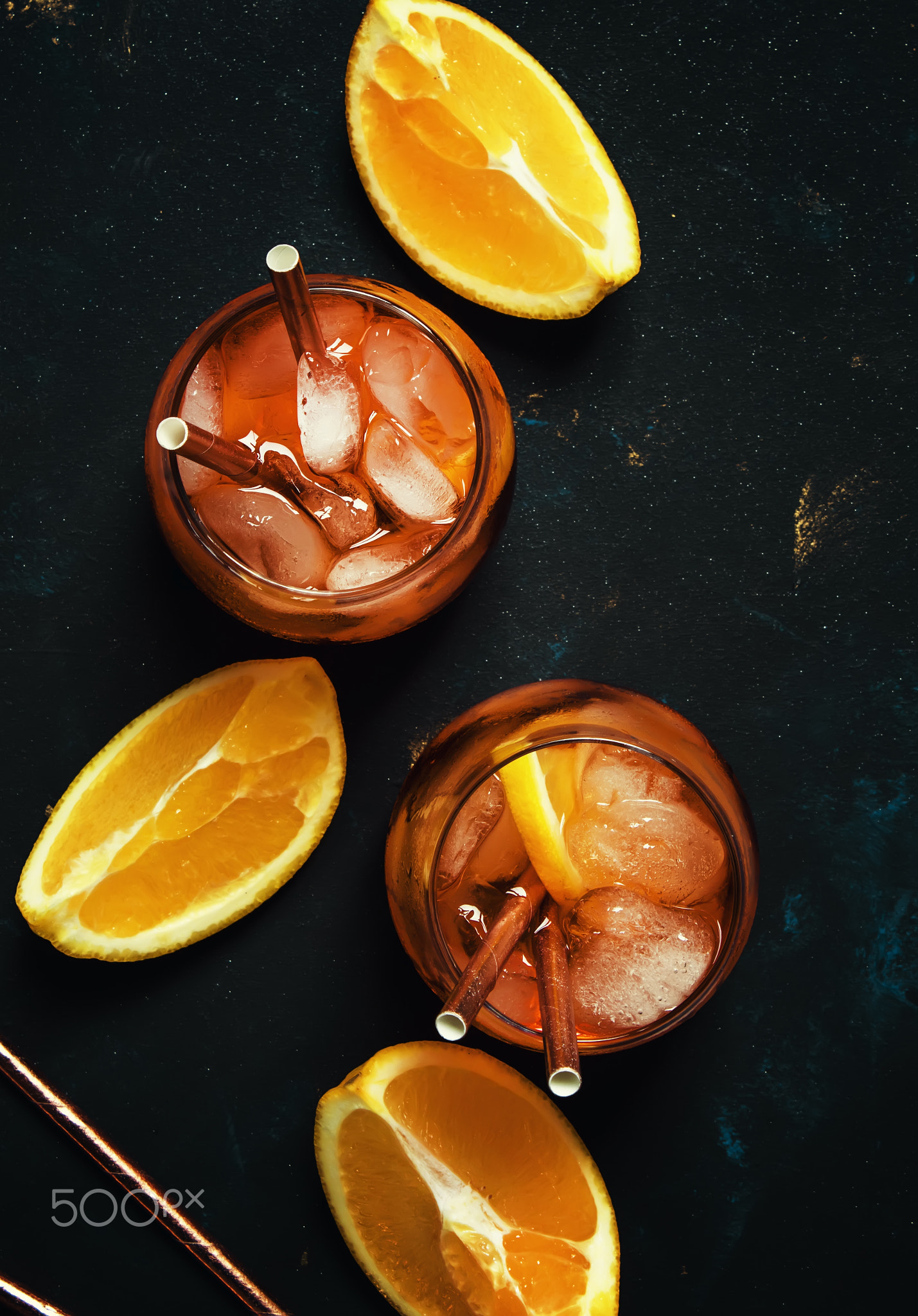 Summer alcoholic cocktail with bitter, sparkling wine, soda, ora