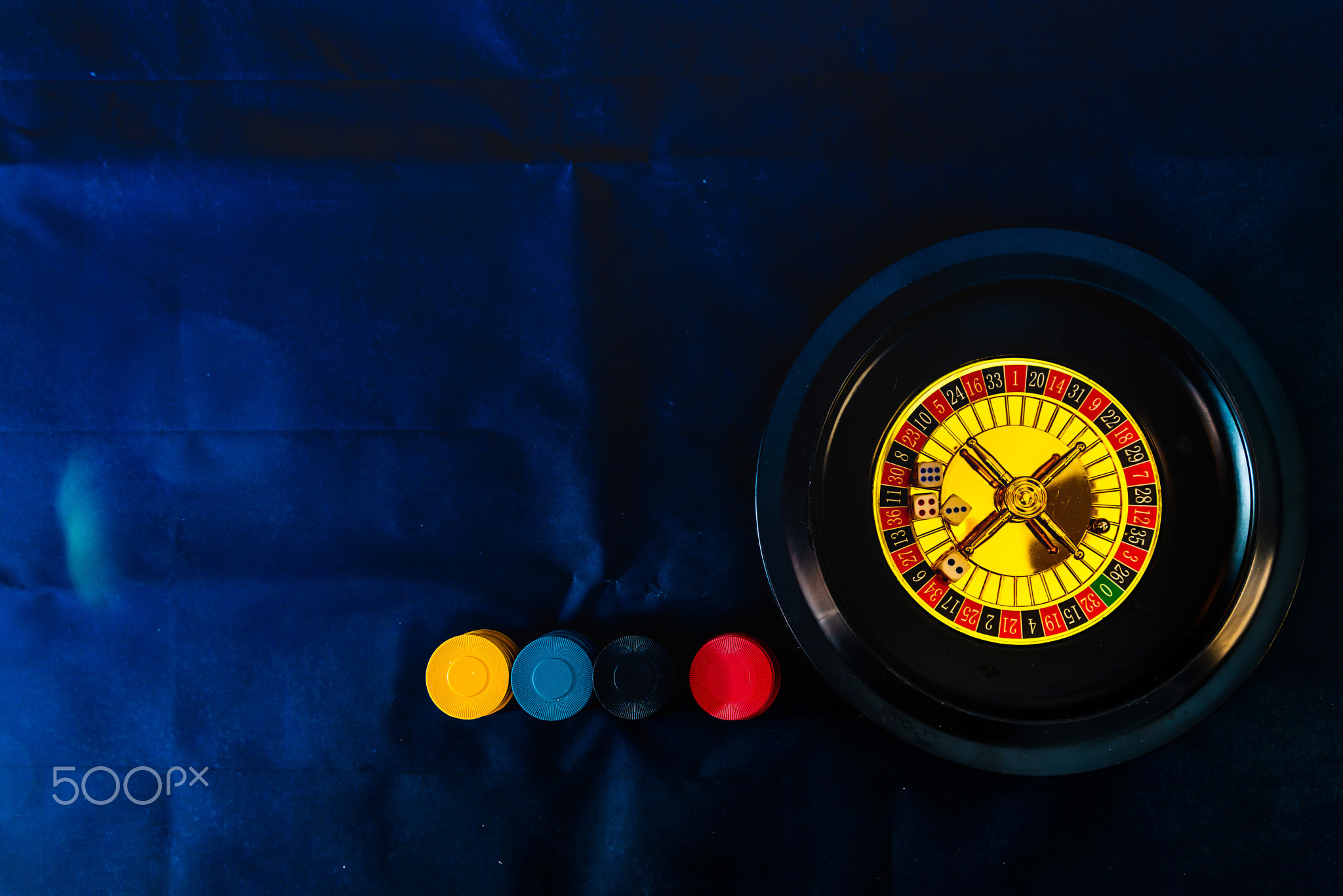 Casino playing roulette on green table