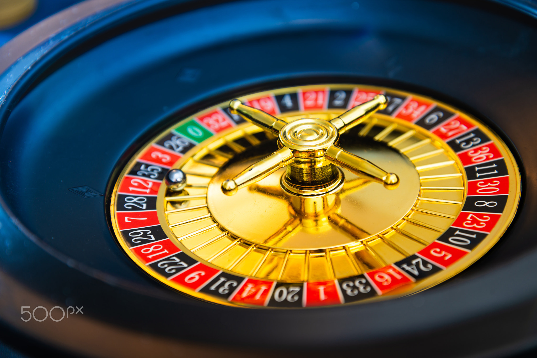 Casino playing roulette on green table