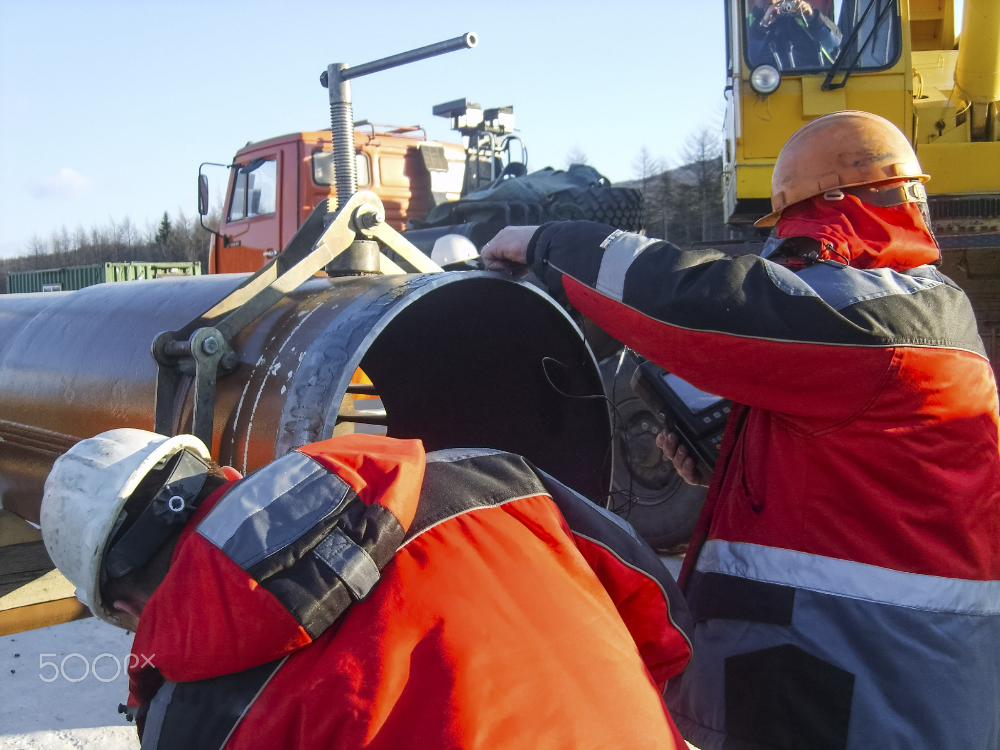 Safety at work. Welding and installation of the pipeline. Indust