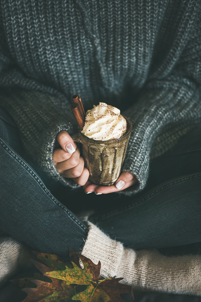 Mug with hot chocolate of coffee in hands of woman by Anna Ivanova on 500px.com