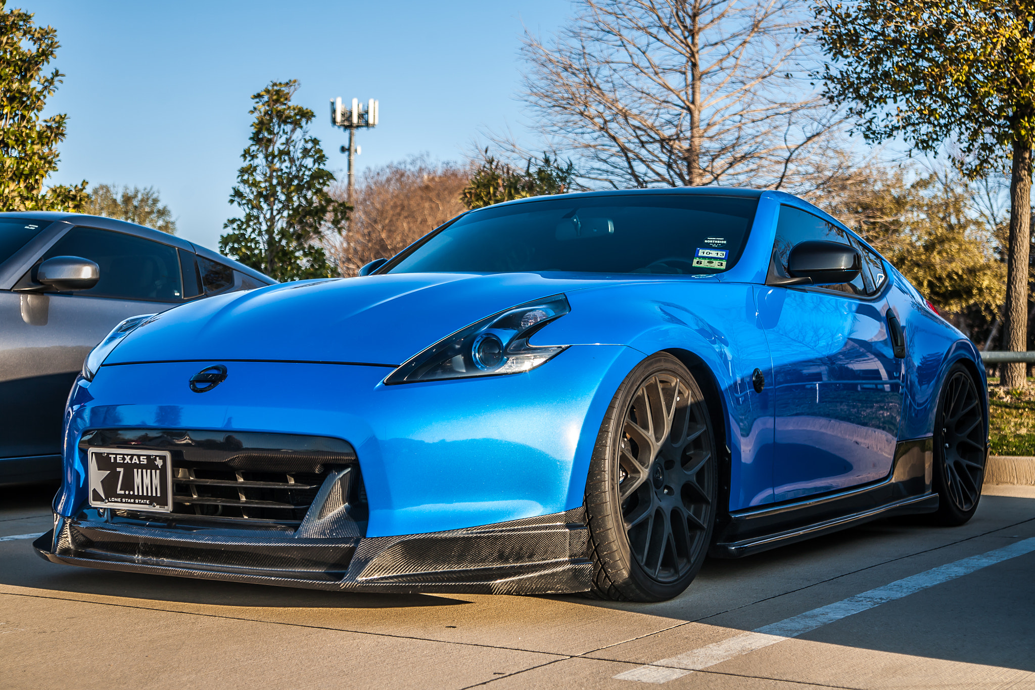 Blue Nissan 370Z with Carbon Fiber Front Lip and Sideskirts at Cars ...