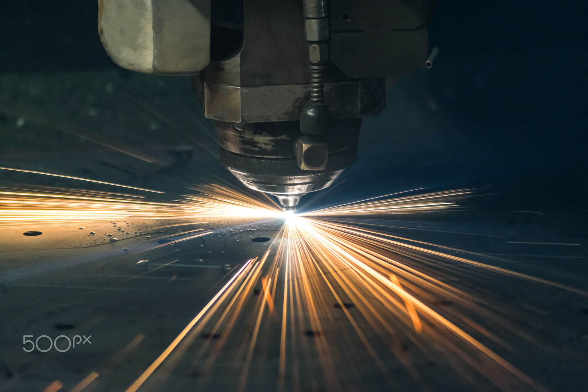 Industrial laser sheet metal cutting.