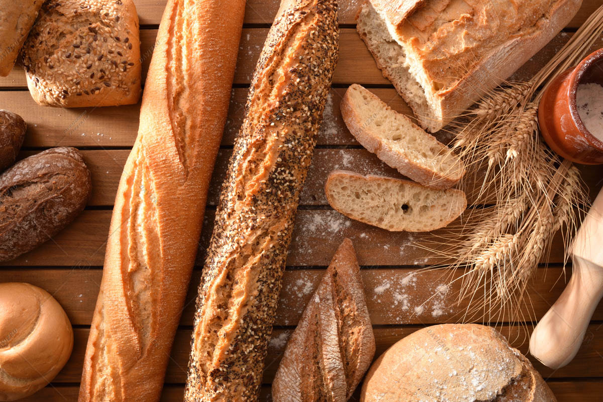 Variety selection of breads on table detail top