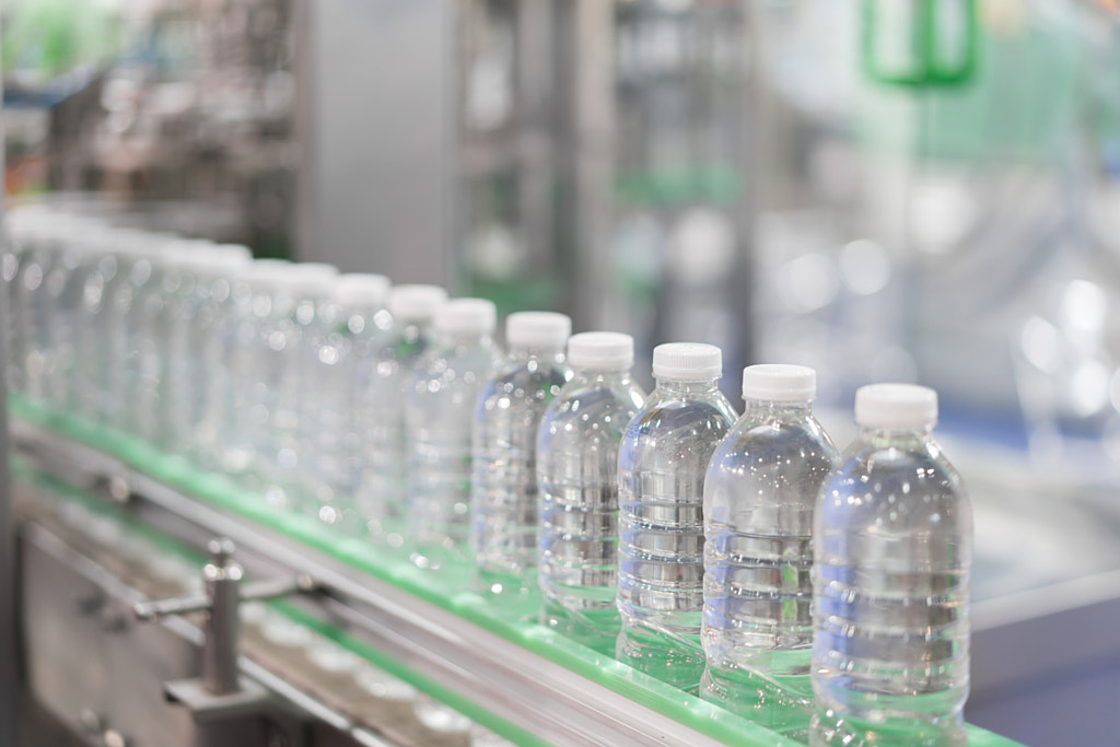 Clear Water Bottles transfer on Conveyor Belt System. Industrial by Prasit Rodphan on 500px.com