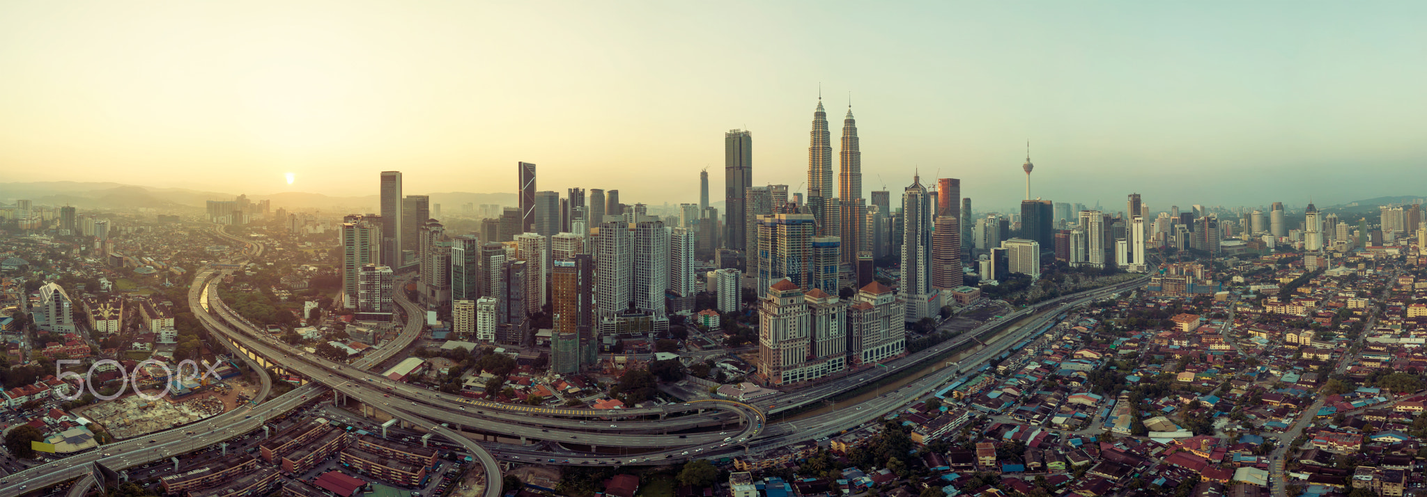 Panorama aerial view in the middle of Kuala Lumpur cityscape skyline , early morning sunrise...
