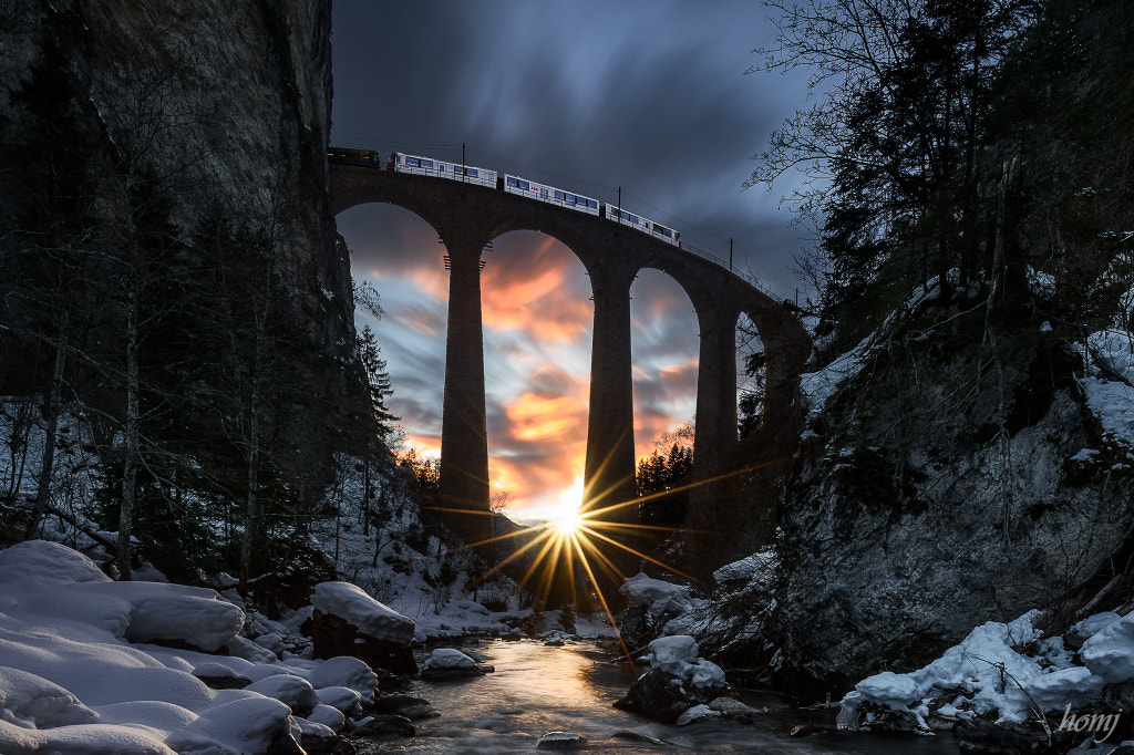 "Sunset behind the bridge" by Jürg Homberger on 500px.com