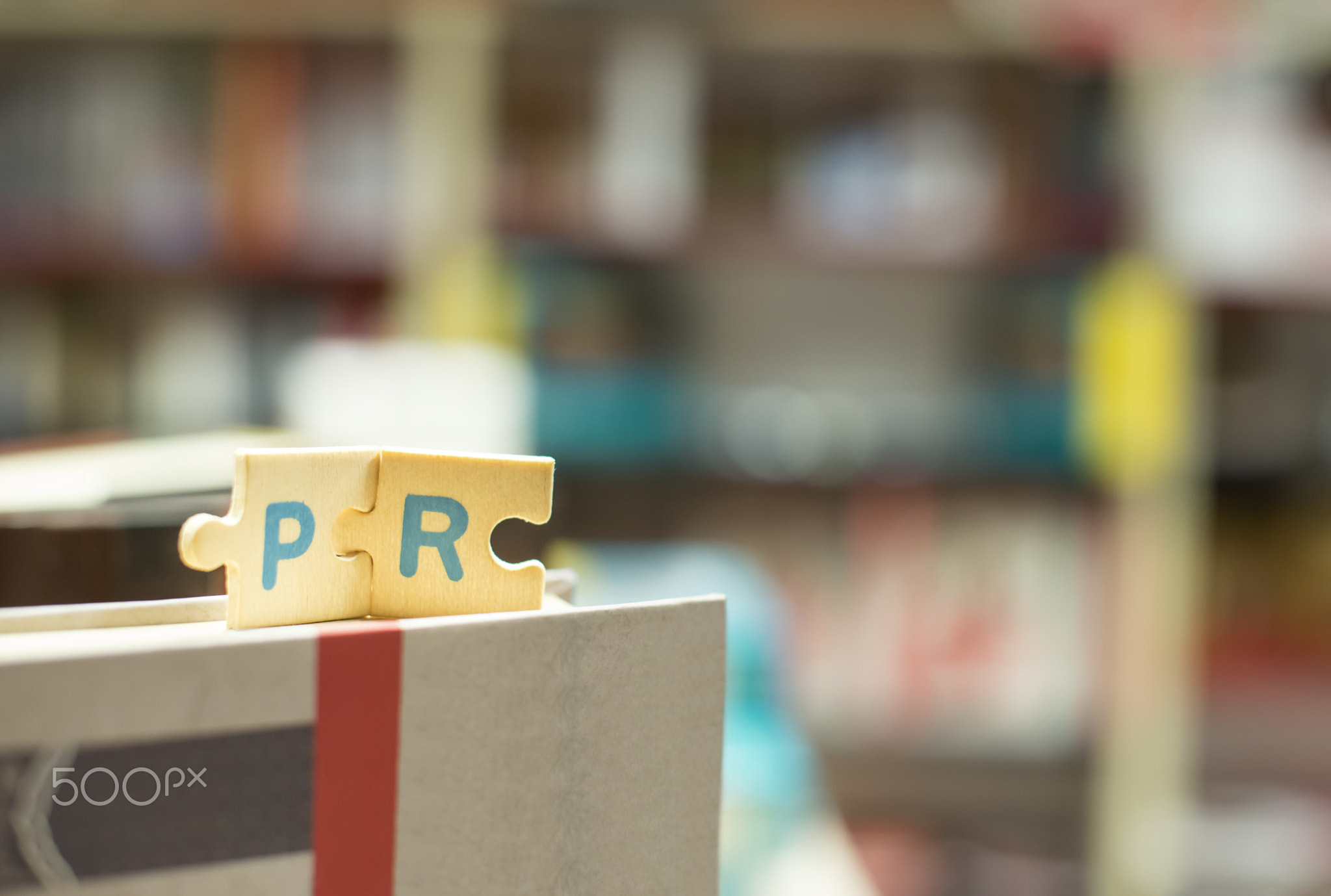 PR letters. Word PR on books in bookstore.