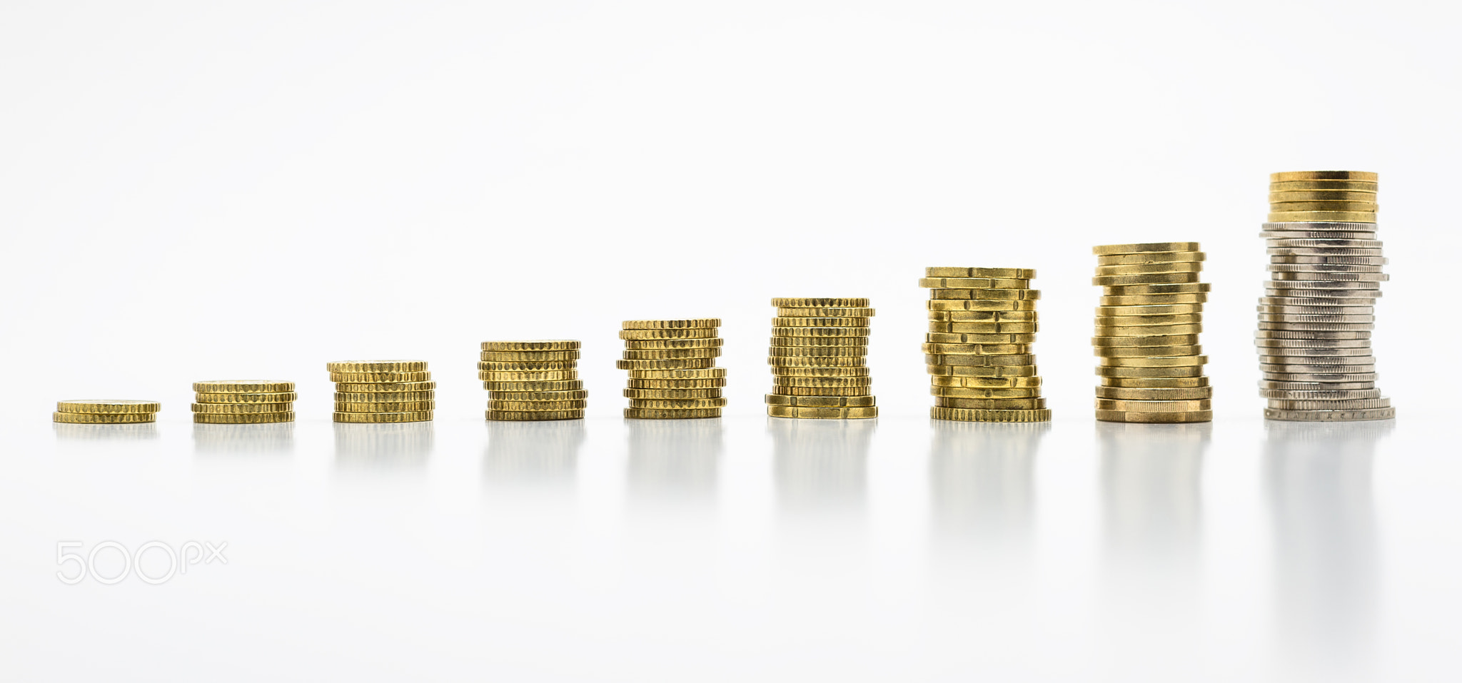 Stack of gold coins, isolated on white background.