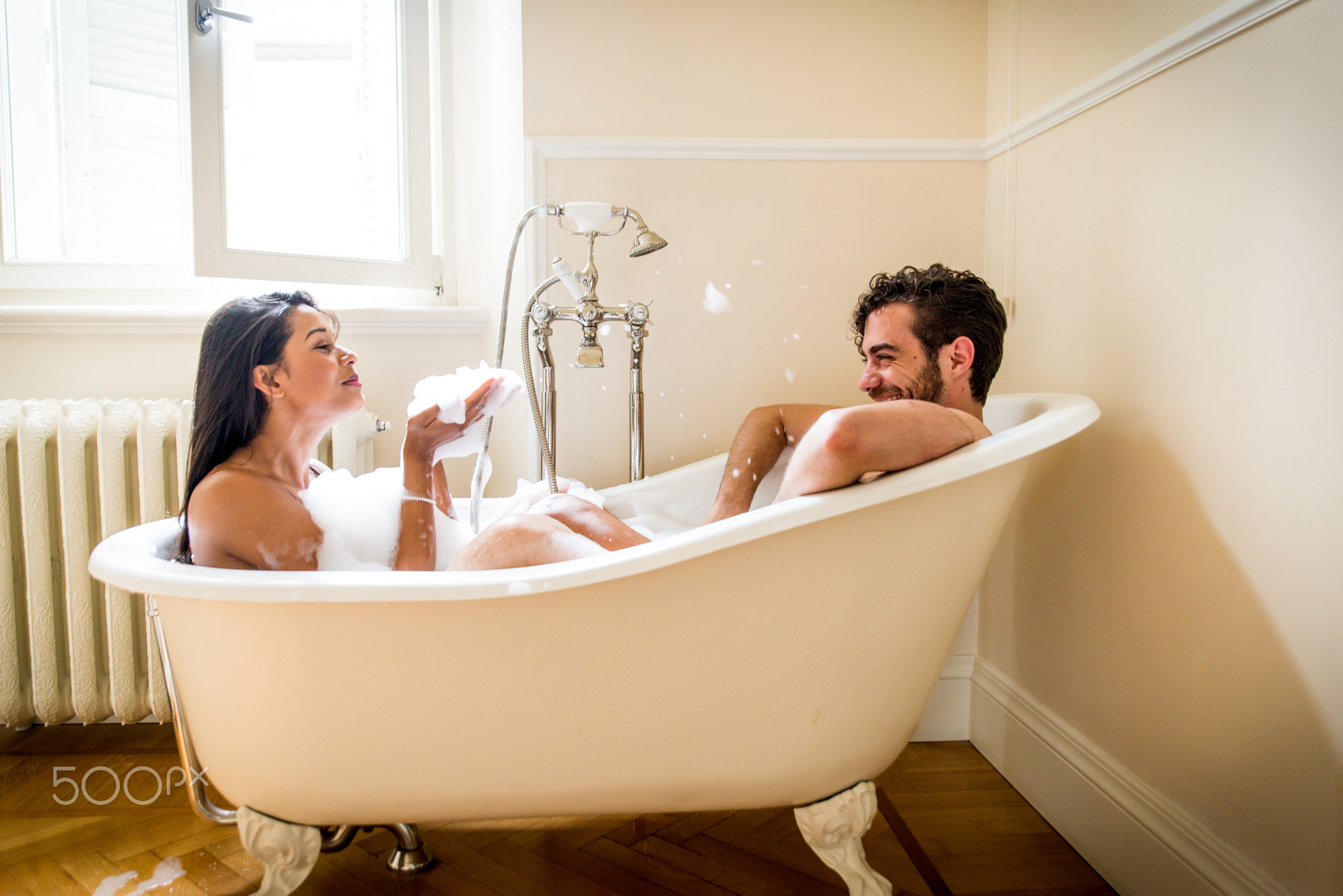 Couple of lovers in the bathroom