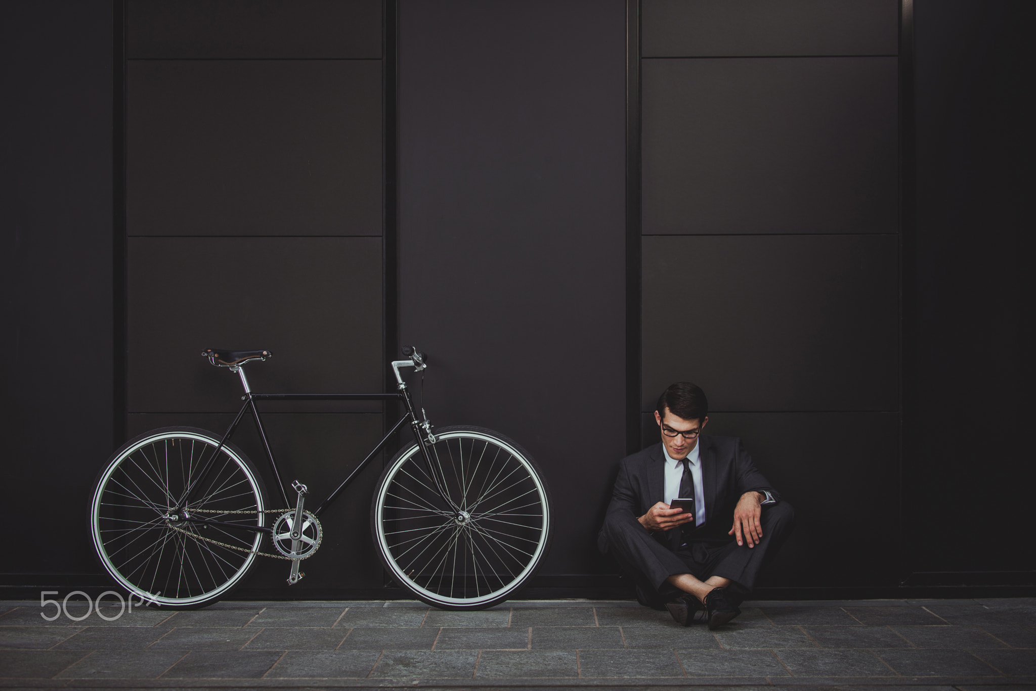 Businessman cycling outdoors