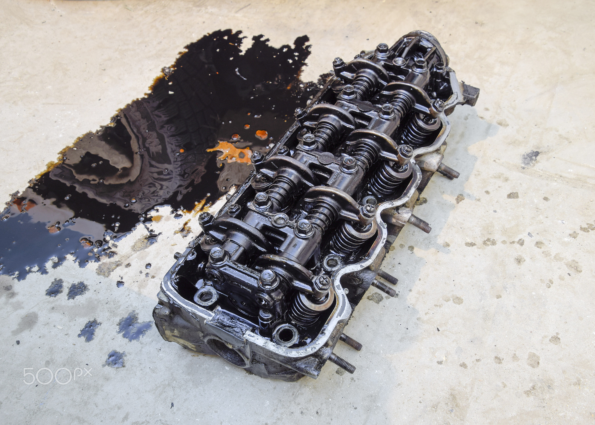 The head of the block of cylinders. The head of the block of cylinders removed from the engine...