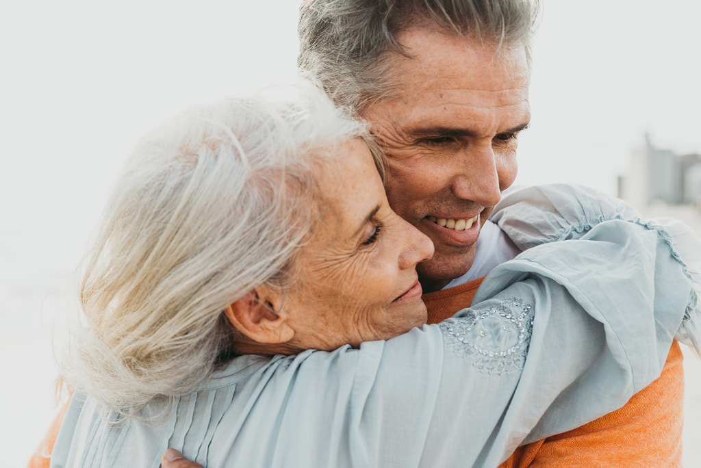 Happy senior couple spending time at the beach. Concepts about l by Cristian Negroni on 500px.com