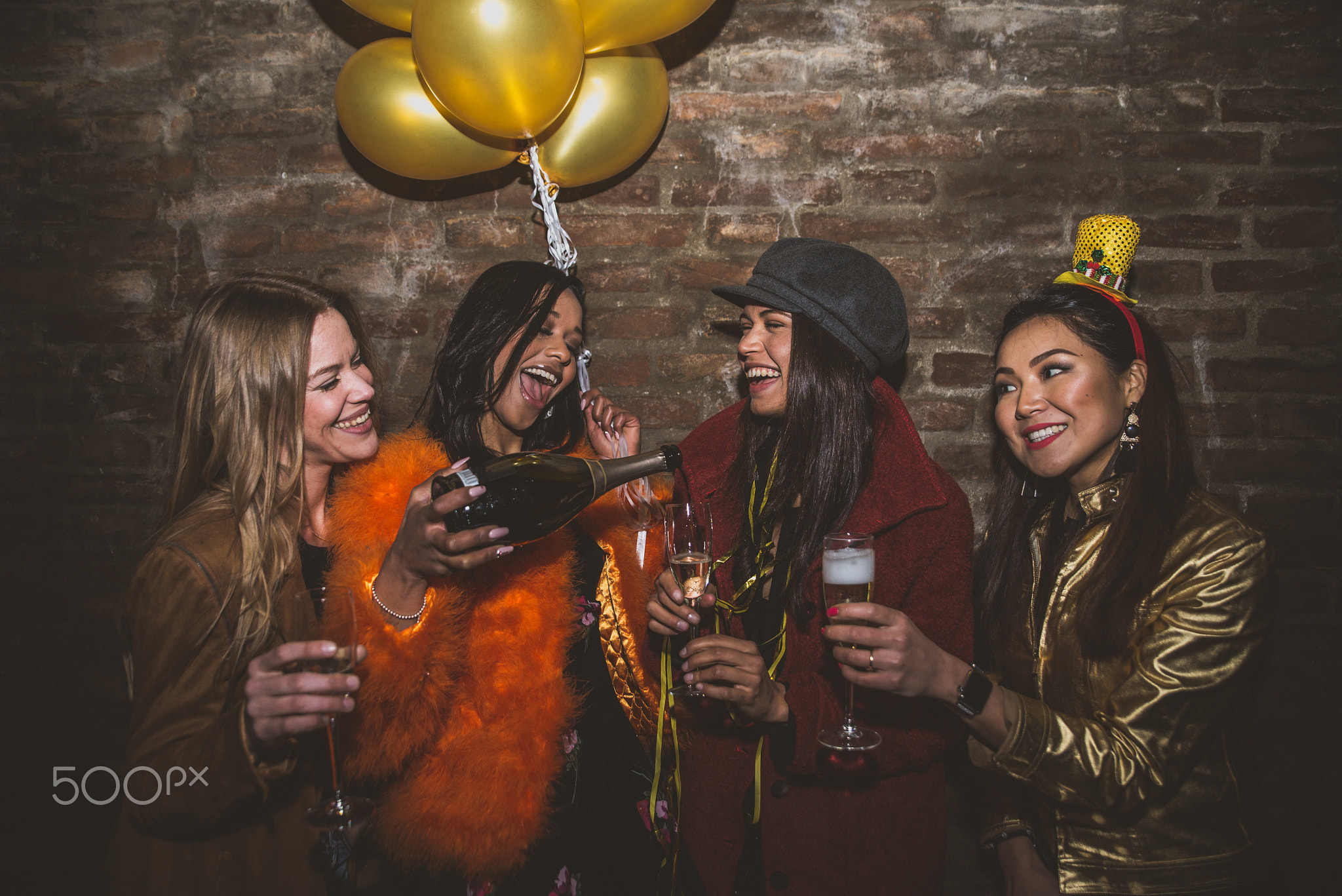 Group of girls celebrating and having fun the club. Concept abou