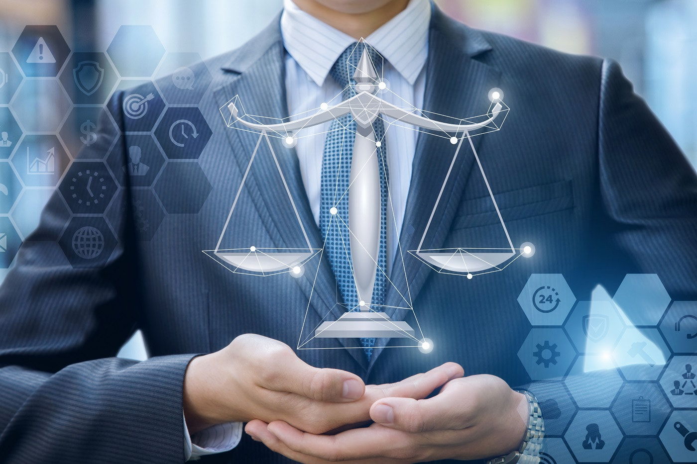 Lawyer in the hands shows the scales.