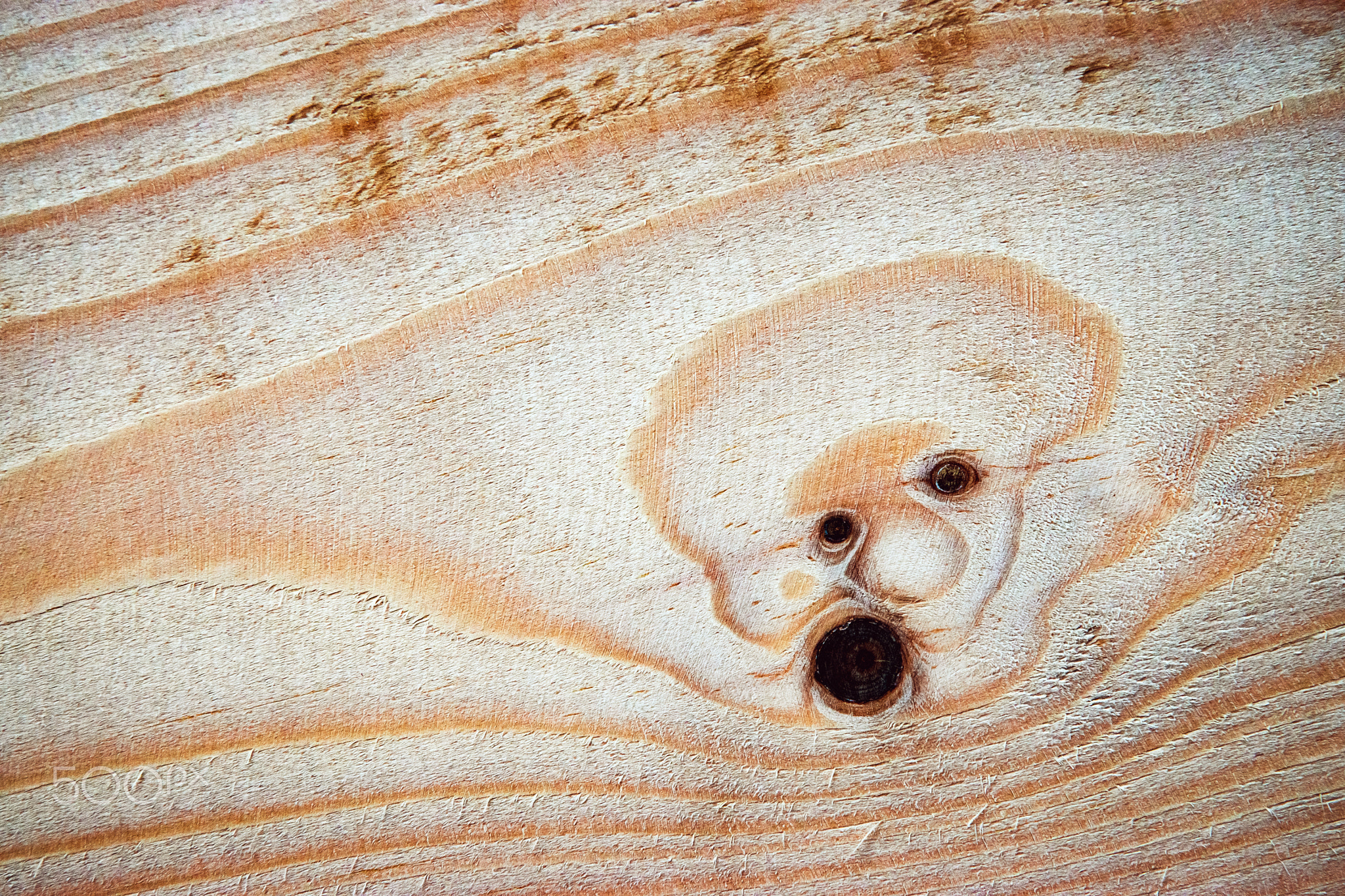 the face of the spirit on a wooden board