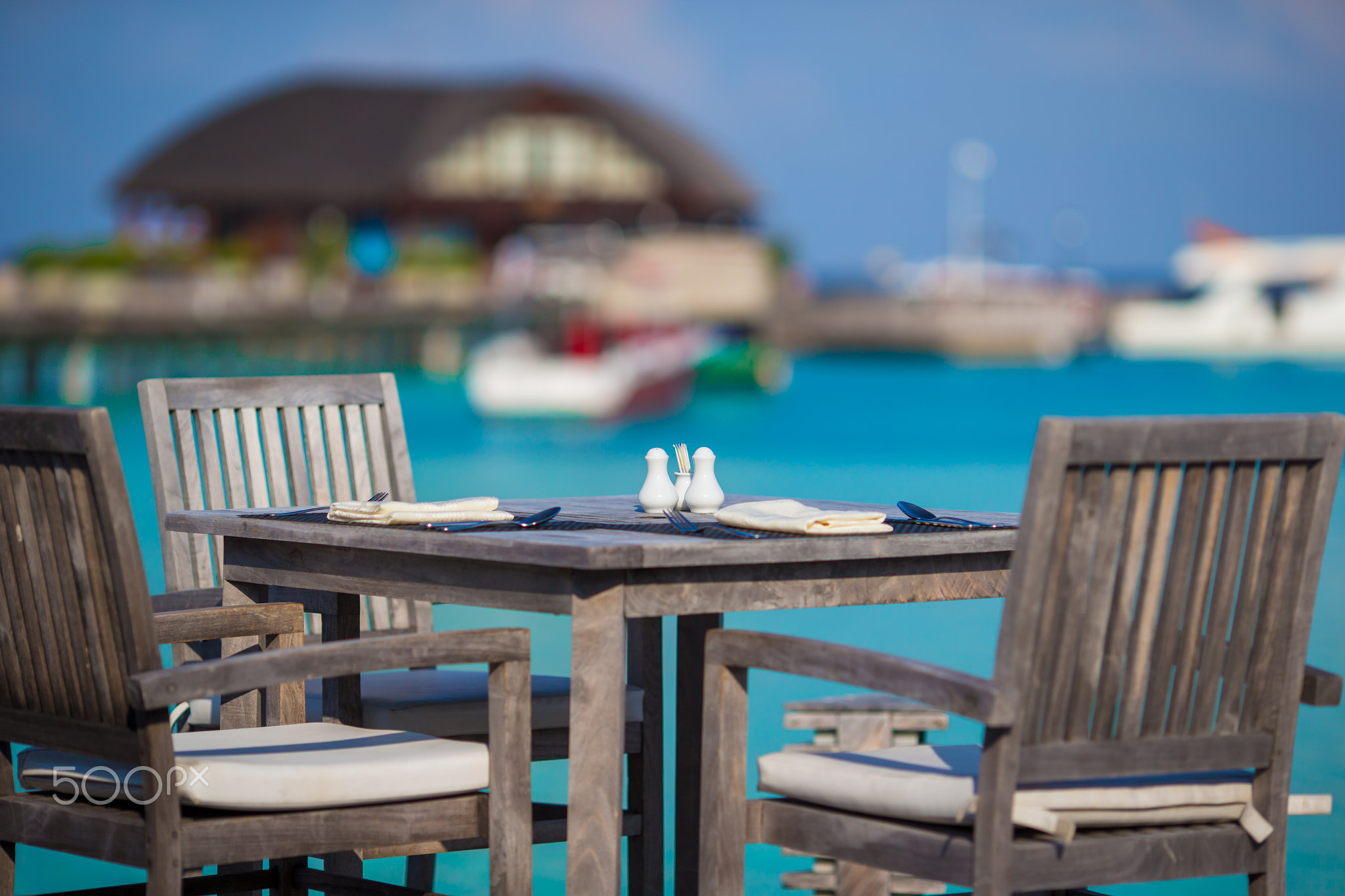 Summer empty outdoor cafe at exotic island in indian ocean