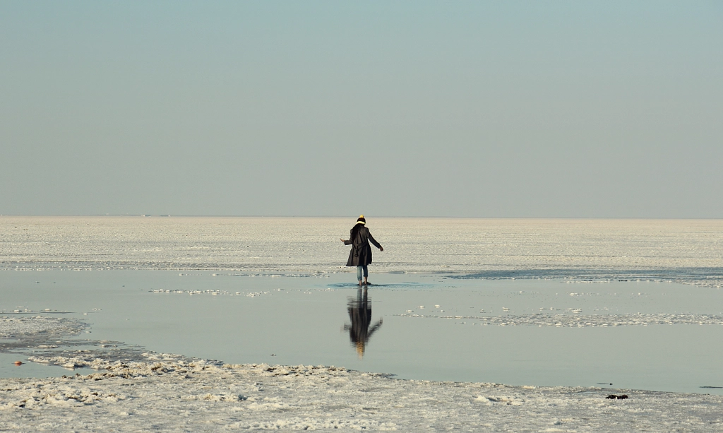 Reflection of a girl in the salt lake by The Storygrapher on 500px.com