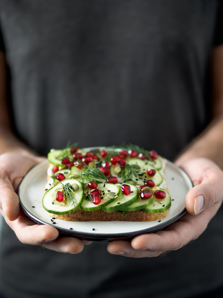 Vegan sandwich with cucmber in male hands by Fascinadora on 500px.com