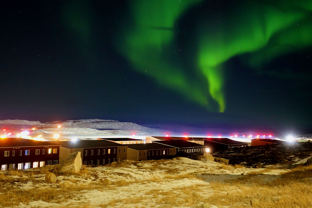 Aurora blooming over a city by Grace Wilk-Scott on 500px.com