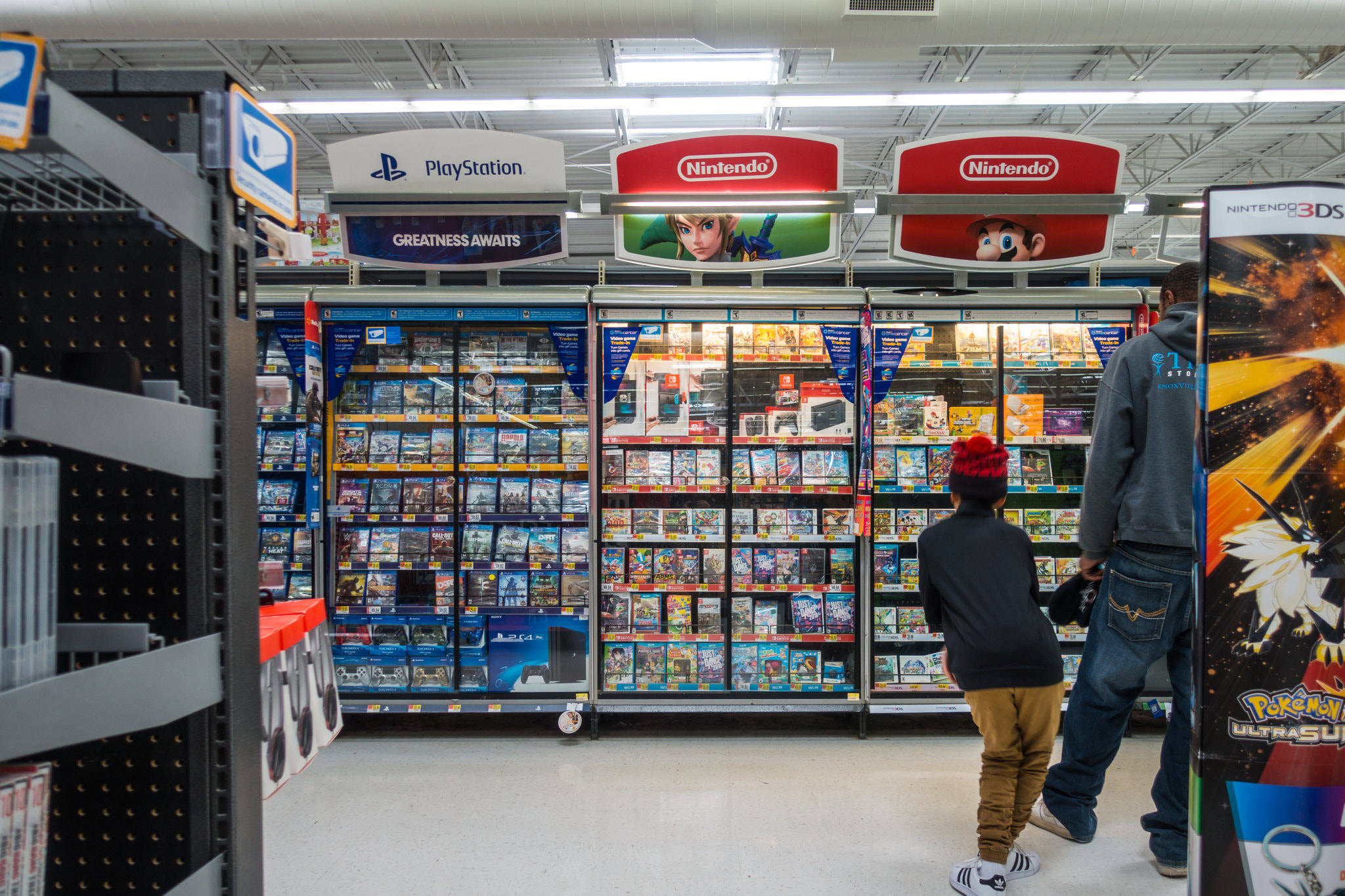 Wal-Mart Video Game Section Little Boy Looking at Games Shopping Scene December 2017