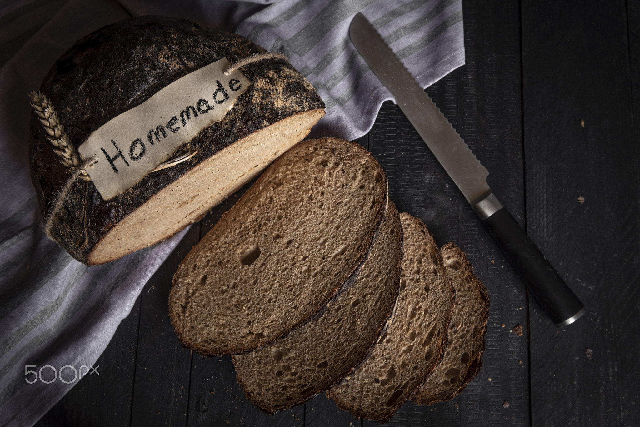 Homemade black bread sliced above view