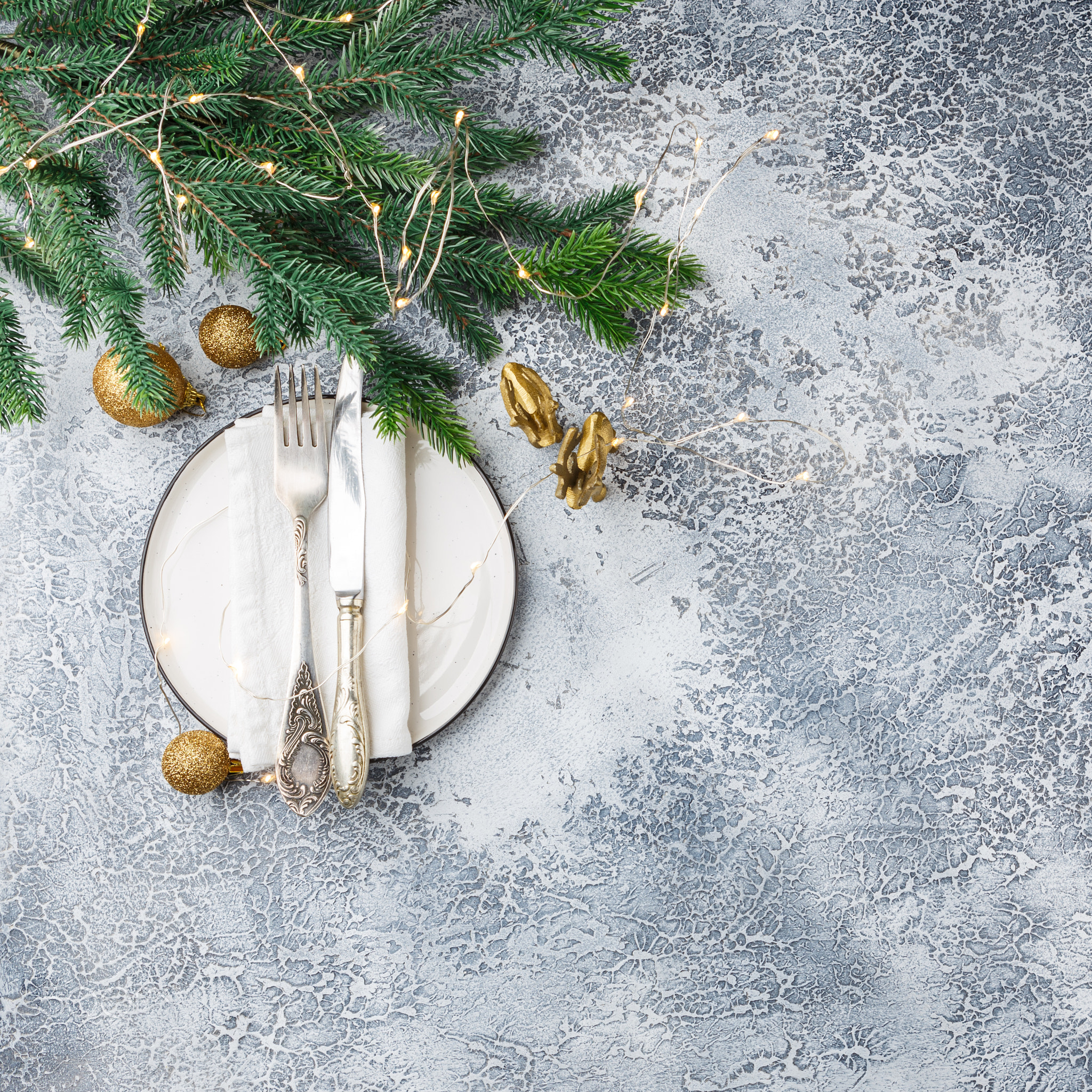 Festive place setting for christmas dinner. Top view. Copy space.
