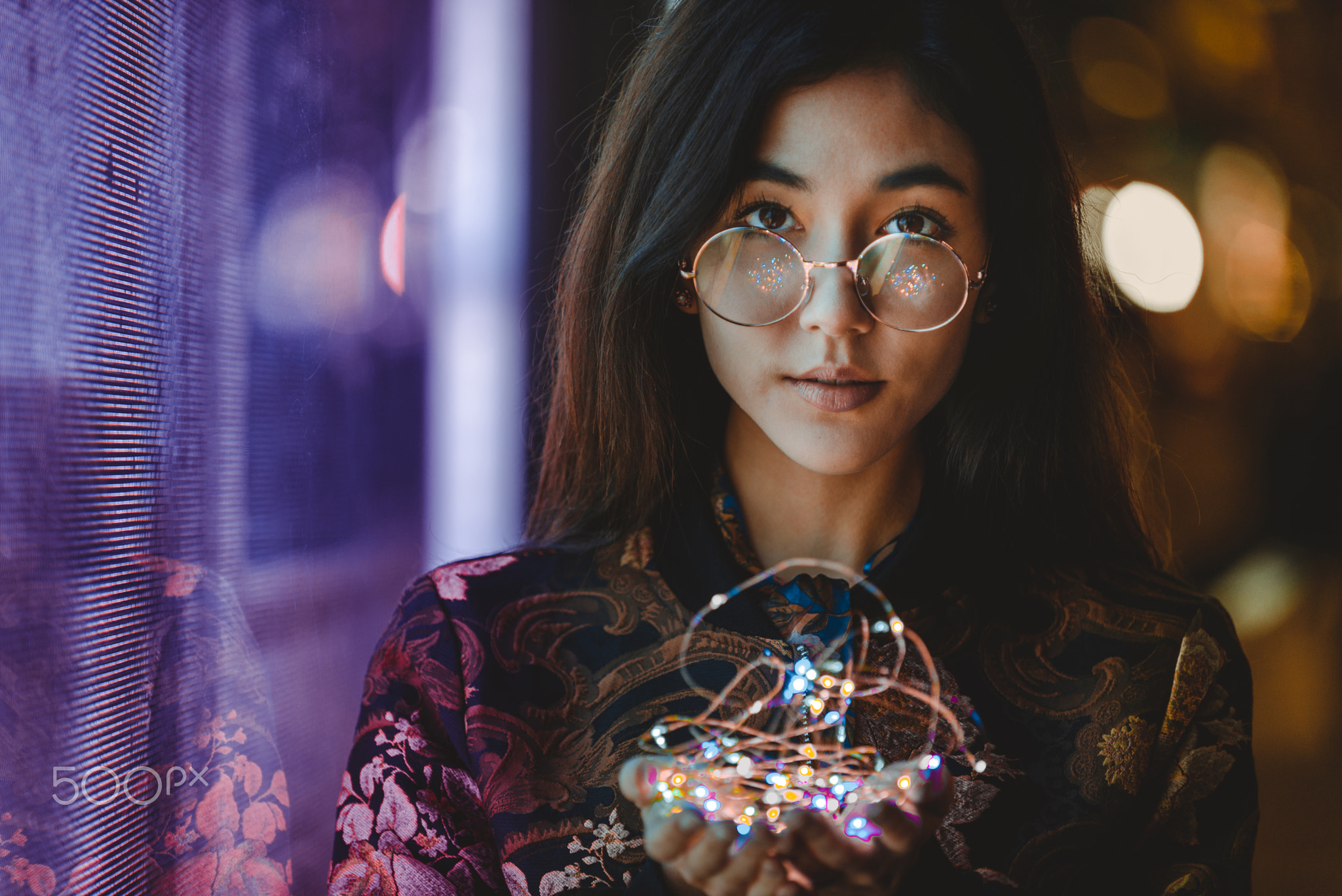 Pretty asian woman portrait with led lights