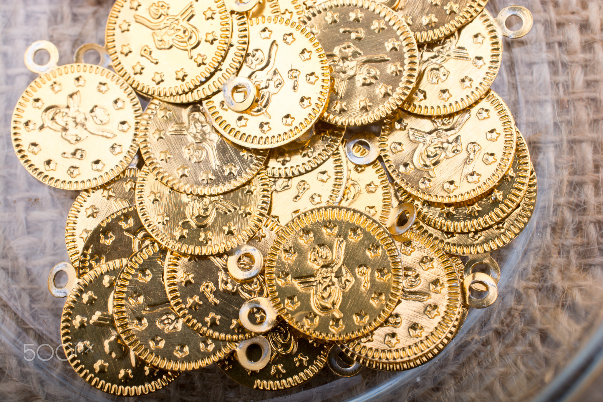 Plenty of fake gold coins are in the view