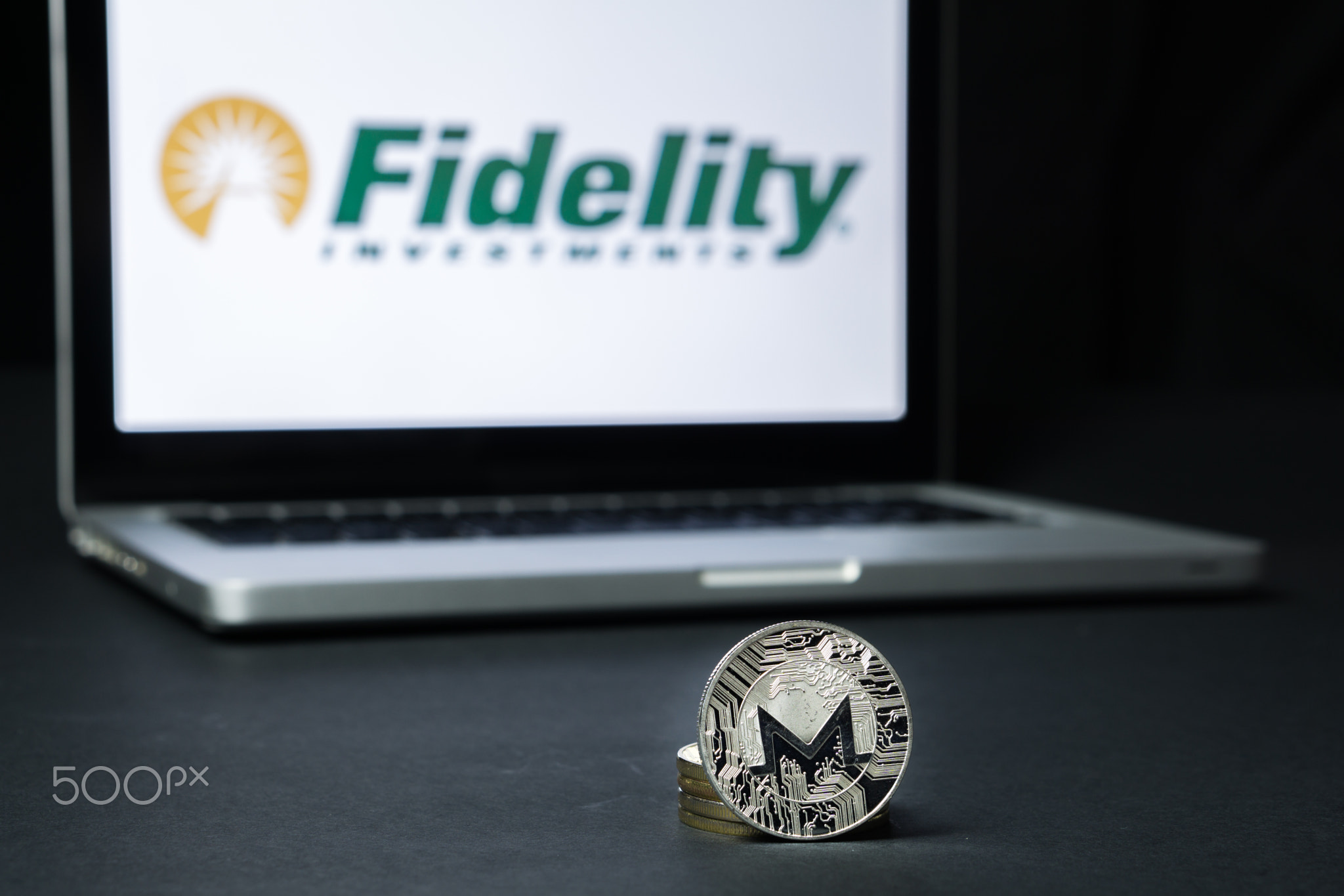Monero coin with the Fidelity logo on a laptop screen, Slovenia - December 23th, 2018