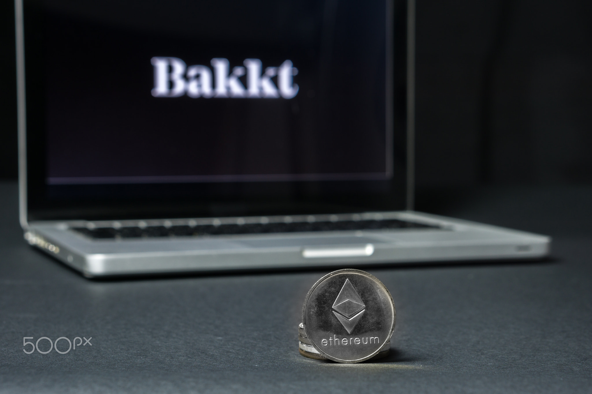 Ethereum coin with the Bakkt logo on a laptop screen, Slovenia - December 23th, 2018